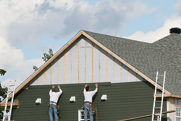Professional Siding Installation technician working in Peninsula, OH